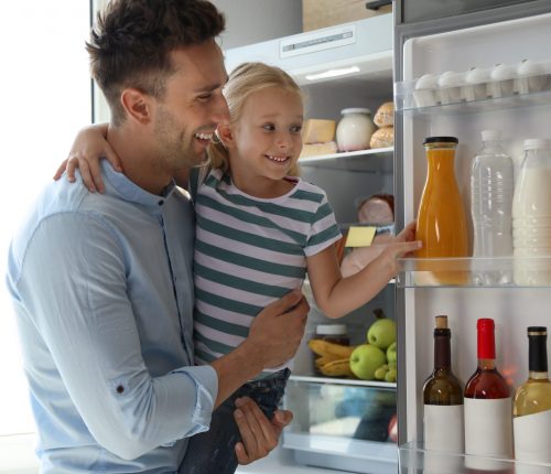 Father,And,Daughter,Taking,Bottle,With,Juice,Out,Of,Refrigerator